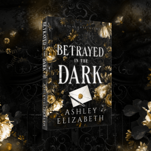 New cover for Betrayed in the Dark. Black and gold/yellow paperback with letter on front. 5.5 by 8.5 inches.